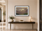Albert Bierstadt Print, In the High Mountains displayed above a console table
