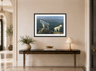 Albert Bierstadt Print, Mountain goats displayed above a console table