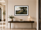 Albert Bierstadt Print, Olevano displayed above a console table