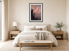 Albert Bierstadt Print, Sunrise on the Matterhorn displayed above a bed