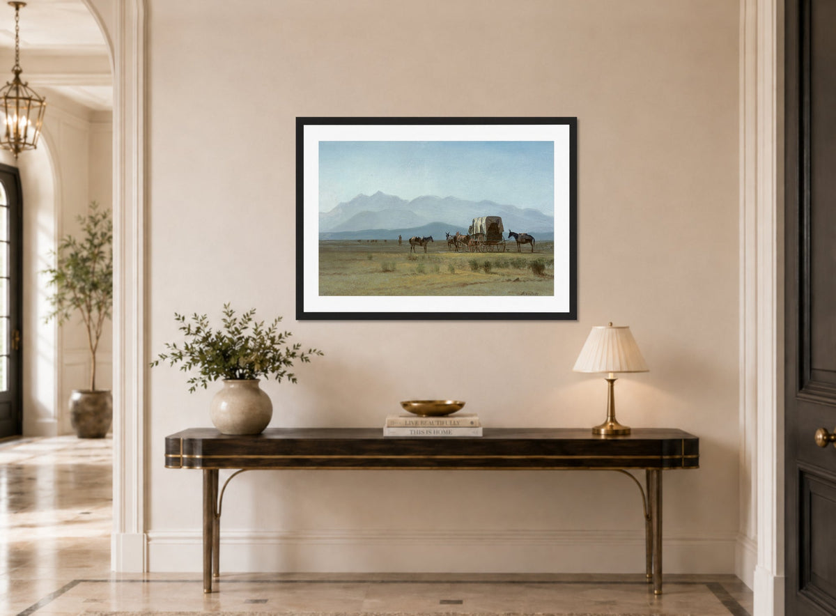 Albert Bierstadt Print, Surveyor’s Wagon in the Rockies displayed above a console table