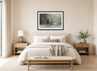 Albert Bierstadt Print, Winter In Yosemite displayed above a bed