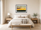 Amaldus Nielsen Print, Aftenhimmel (1900) displayed above a bed