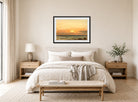 Amaldus Nielsen Print, Aftenstemning (1894) displayed above a bed
