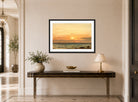 Amaldus Nielsen Print, Aftenstemning (1894) displayed above a console table