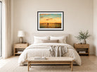 Amaldus Nielsen Print, Aftenstemning, Kristianiafjorden (1914) displayed above a bed