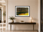 Amaldus Nielsen Print, Fjellvegg,Terøen (1897) displayed above a console table
