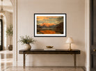 Amaldus Nielsen Print, Fra Balestrand (1865) displayed above a console table