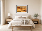 Amaldus Nielsen Print, From the Risøbank near Mandal (1889) displayed above a bed