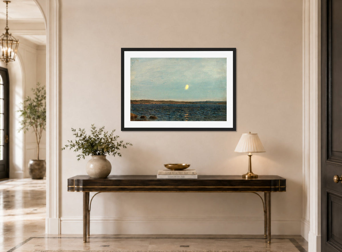 Amaldus Nielsen Print, Måneskinn, Hvaler (1898) displayed above a console table