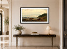 Amaldus Nielsen Print, Regnstemning, Bømmelen (1861) displayed above a console table