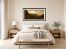 Amaldus Nielsen Print, Stavenes, Søndfjord (1866) displayed above a bed