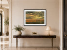Amaldus Nielsen Print, Svartstille (1898) displayed above a console table