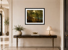 Amaldus Nielsen Print, Ulvegjelskogen, Mandal (1863) displayed above a console table