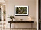 Amaldus Nielsen Print, Under trærne, Hoven ved Mandal (1908) displayed above a console table