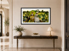 Charles Courtney Curran Print, Lotus Lilies (1888) displayed above a console table