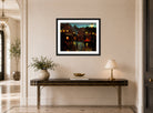 Charles Courtney Curran Print, Paris at Night (1889) displayed above a console table