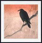 A framed Japanese-style art print featuring a black bird perched on a branch against a warm peach and beige background, with a white mat and black frame.