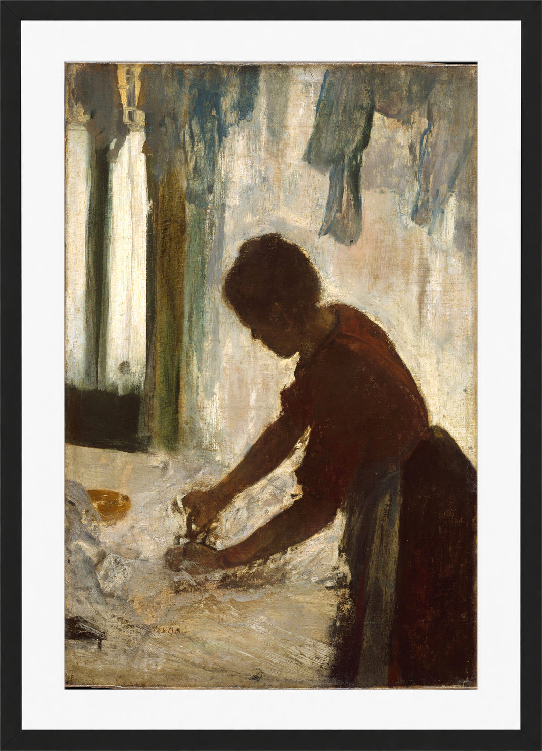 Edgar Degas Print, A Woman Ironing (1873) in a black frame