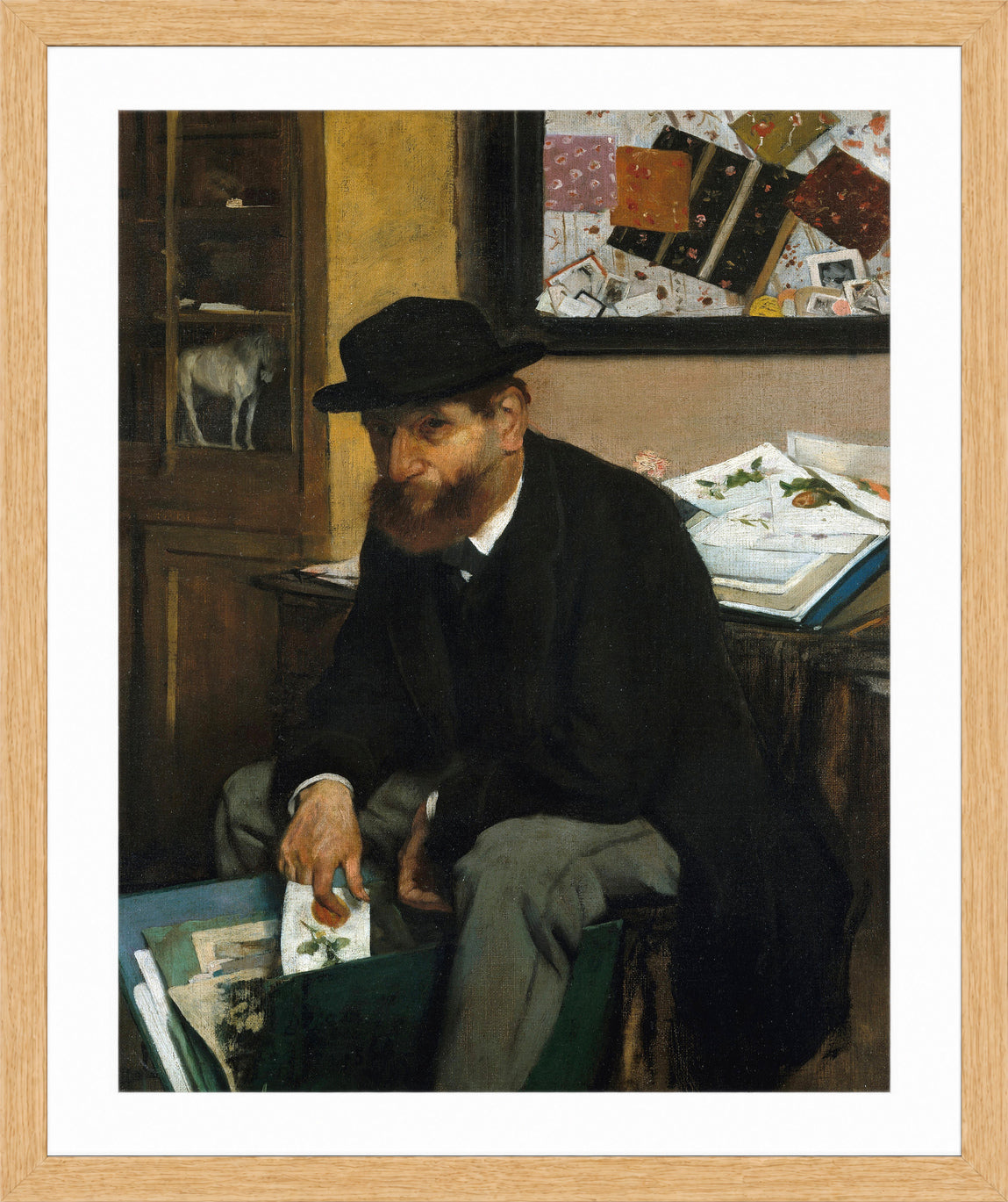 Edgar Degas Print, The Collector of Prints (1866) in a light oak frame