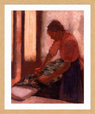 Edgar Degas Print, Woman Ironing (between 1892 and 1895) in a light oak frame