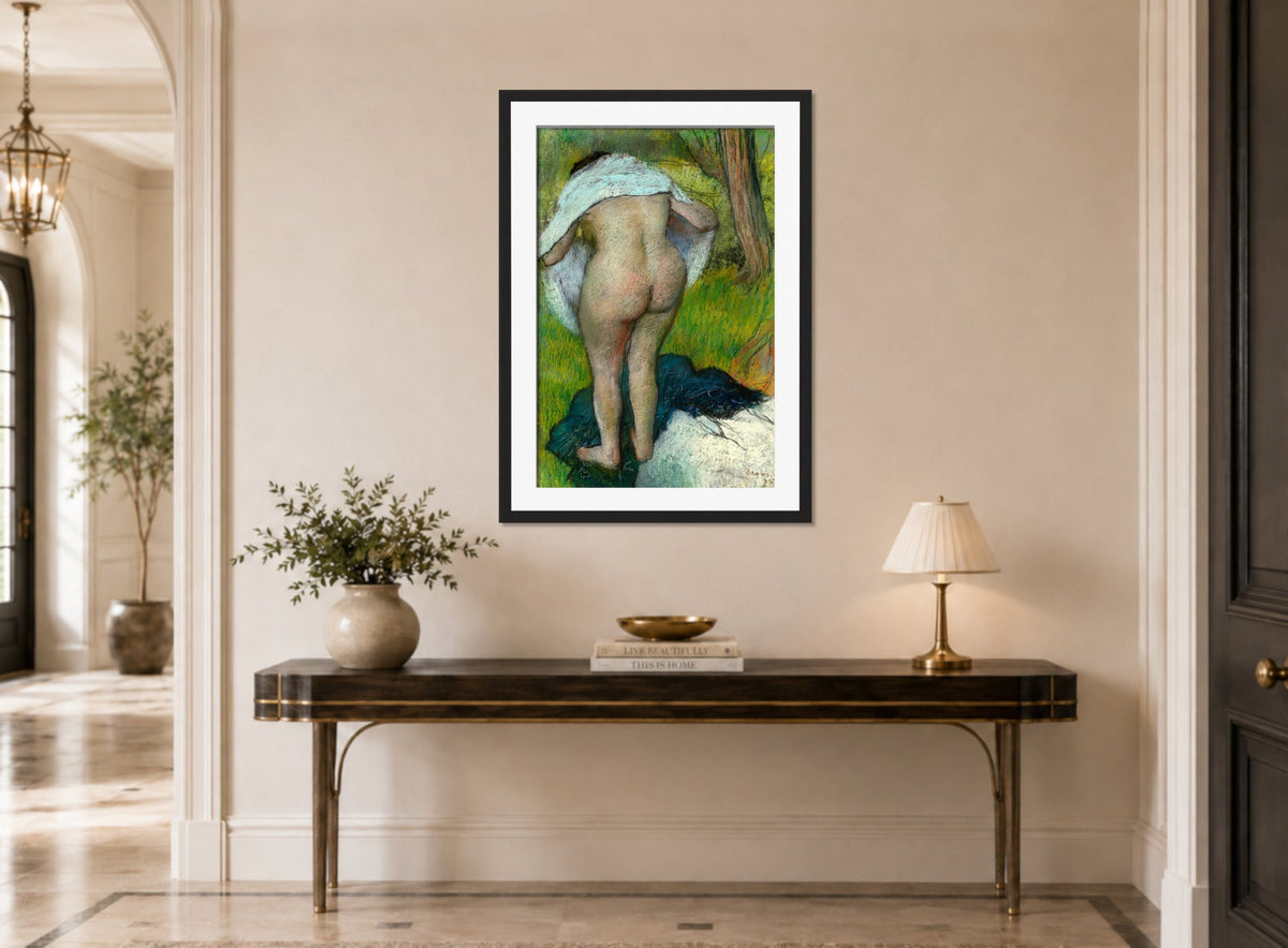 Edgar Degas Print, Young Woman Dressing Herself (1885) displayed above a console table