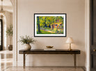 Edward Cucuel Print, Frühlingsgarten in Starnberg (1920) displayed above a console table