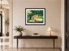 Edward Cucuel Print, Summer in the garden of the artist’s villa on Lake Starnberg (1920) displayed above a console table