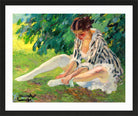 Edward Cucuel Print, Undressing (sitting in the grass) (1910) in a black frame