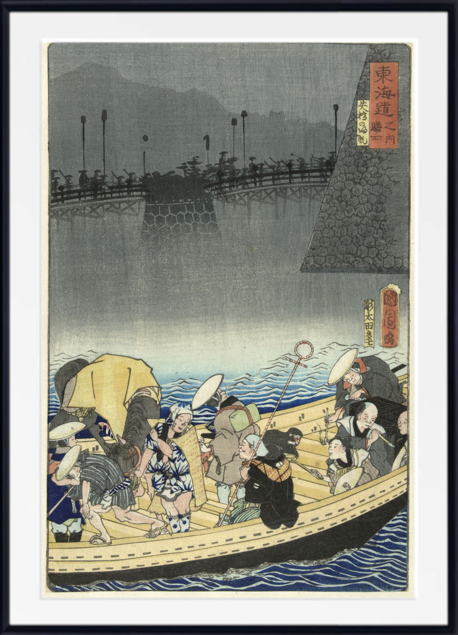 A framed Japanese ukiyo-e woodblock print depicting a crowded boat scene on blue water with a bridge and mountains in the background, shown against a white mat and black frame.
