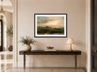 John Constable Print, Stonehenge at Sunset displayed above a console table
