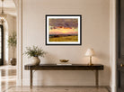 John Constable Print, Summer Evening With Storm Clouds displayed above a console table