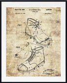 A framed vintage patent print of a lace-up work boot, showing technical line drawings with dates and inventor text on an aged beige background, presented in a black frame with a white mat.