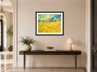 Vincent van Gogh Print, 055 Wheat Field Behind Saint-Paul Hospital with a Reaper_10x8 displayed above a console table