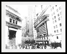 A black and white art print depicting the iconic facade of the New York Stock Exchange surrounded by skyscrapers, with a crowd of people in the foreground, presented in a white mat and black frame.