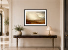 William Trost Richards Print, Passing Storm, Isle of Skye, Scotland displayed above a console table